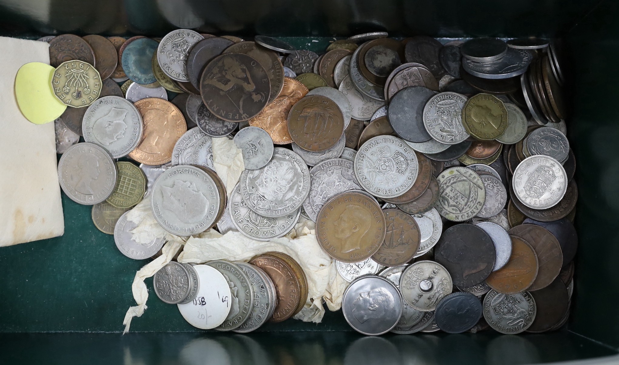 A box of UK and World coins including George V and George VI florins, shillings etc